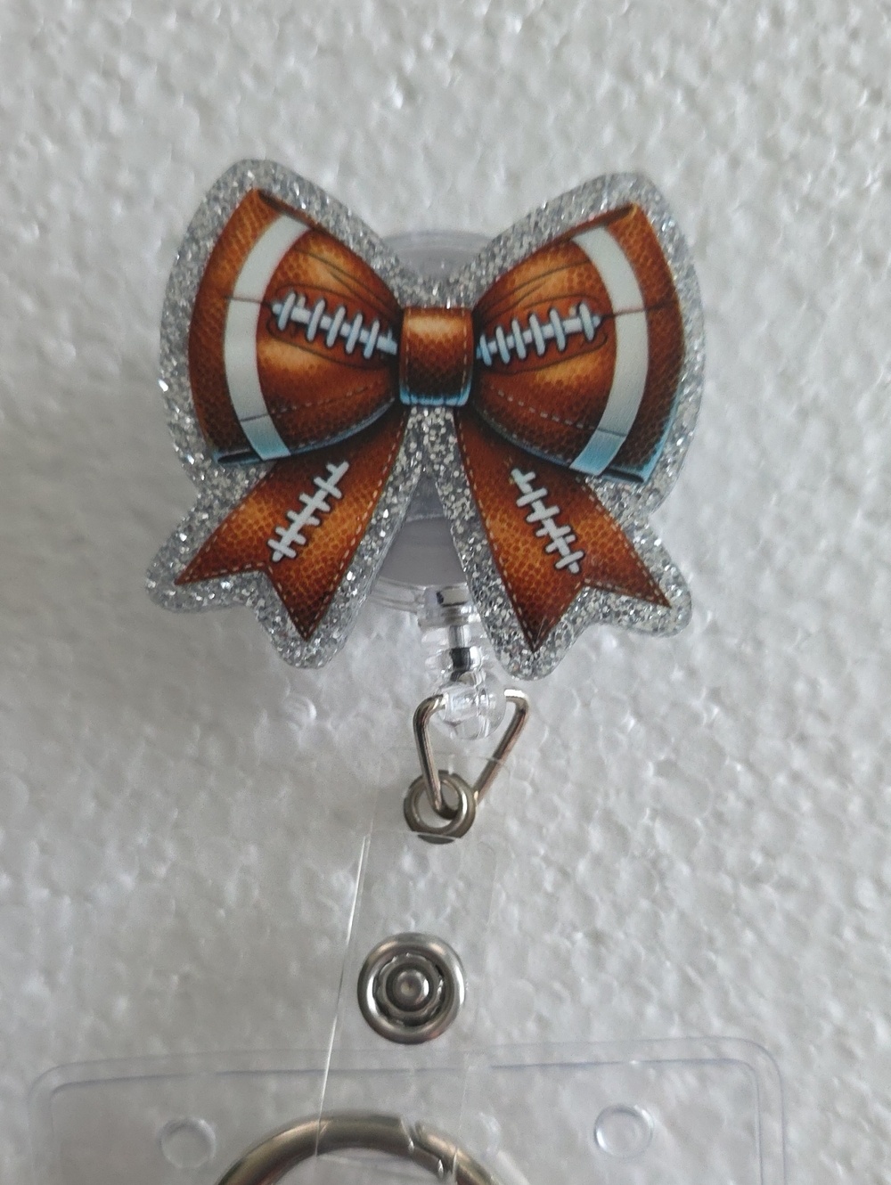 Football Bow Badge Reel